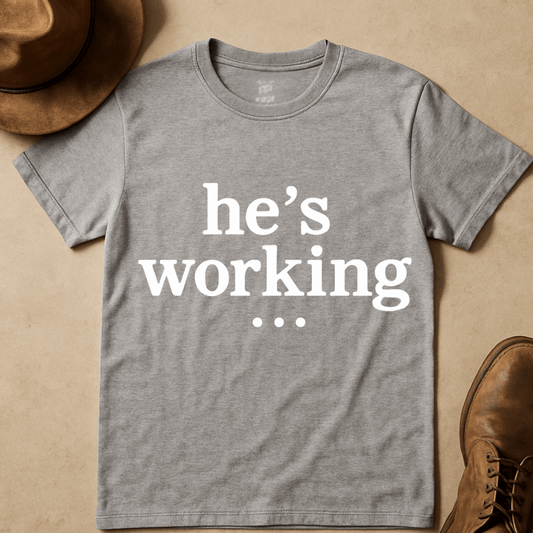 HE'S WORKING... T-SHIRT